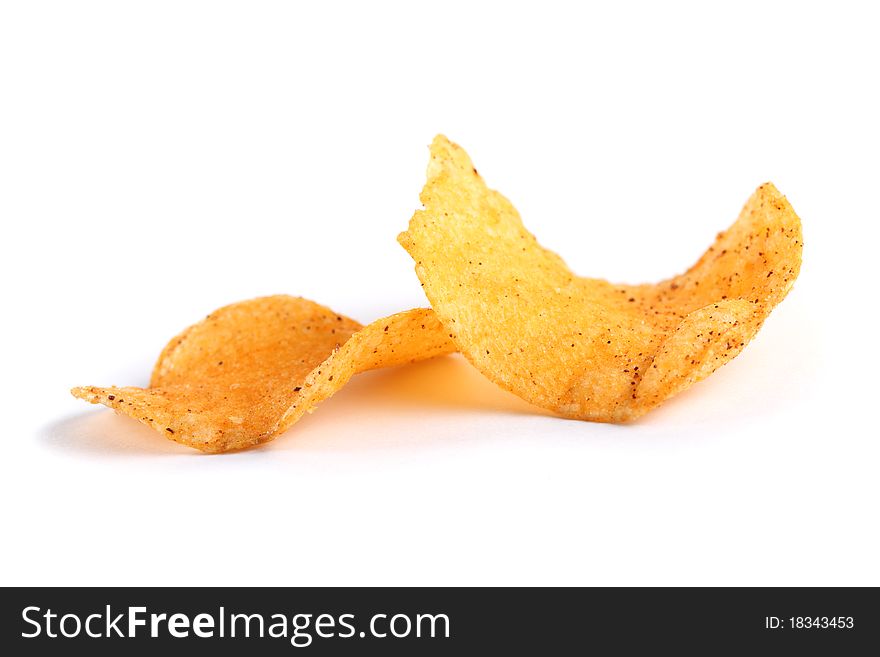 Close up of potato chips isolated on white background.