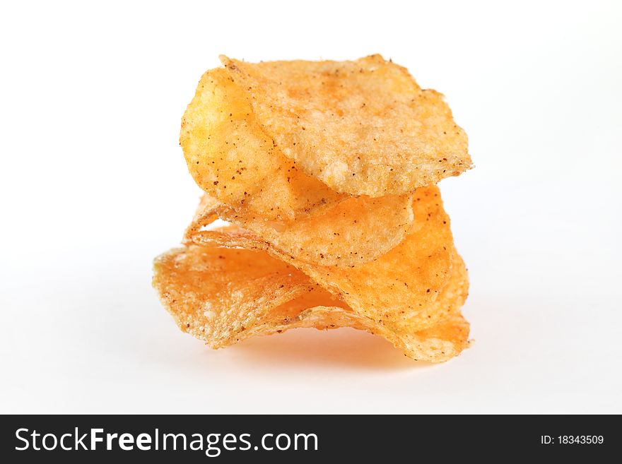 Close up of potato chips isolated on white background.