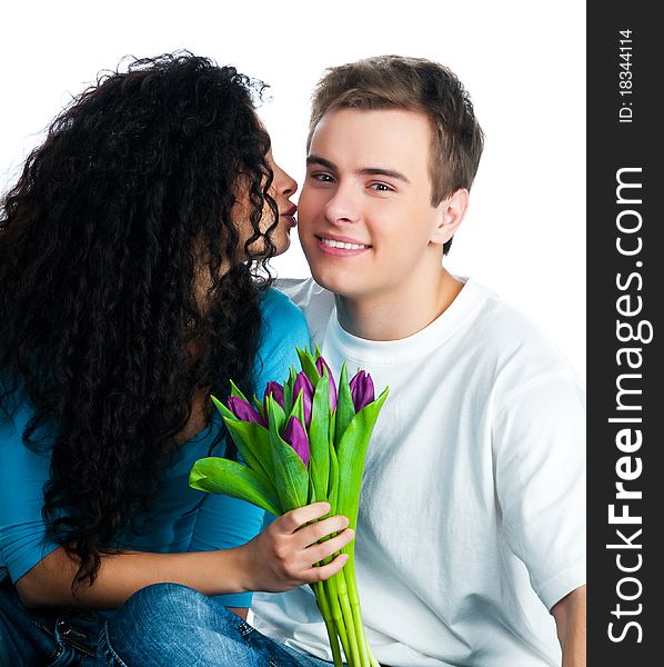 Beautiful young couple with tulips