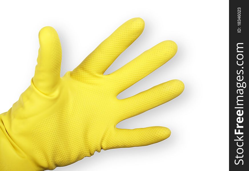 The image shows a human hand with a rubber glove over white. The image shows a human hand with a rubber glove over white