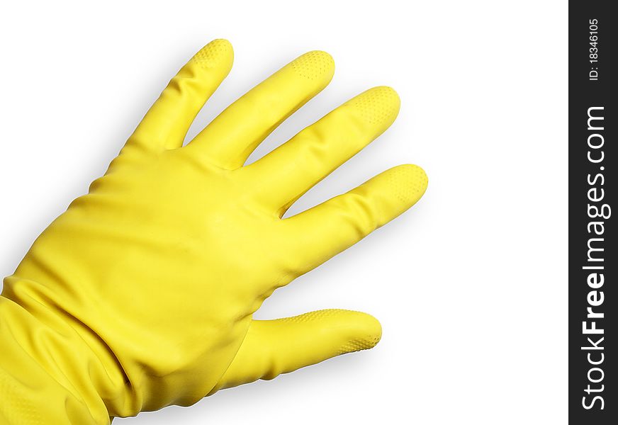 The image shows a human hand with a rubber glove over white. The image shows a human hand with a rubber glove over white