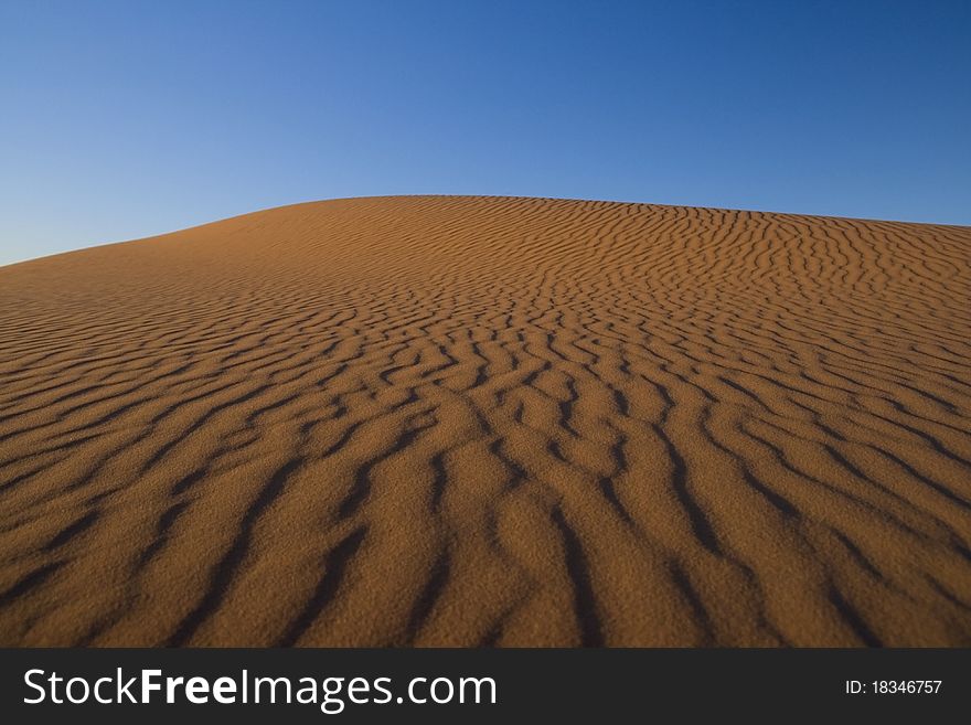 Colorful Sand Dunes In The Morning Sunlight