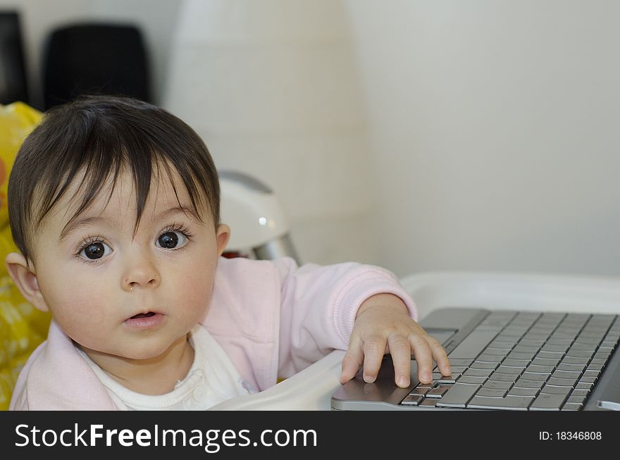 1 Year Baby Girl trying to use her Netbook, Italy