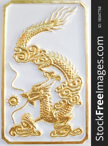 Gold Dragon On The White Background