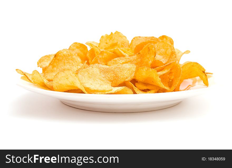 The image of the potato chips isolated on white