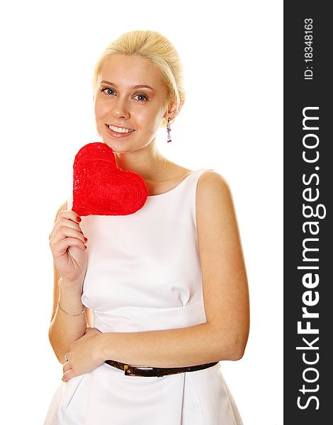 Young attractive elegant woman holding a big red heart. Isolated on a white background. Young attractive elegant woman holding a big red heart. Isolated on a white background