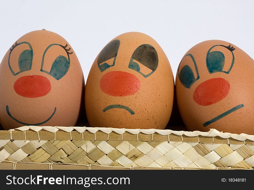 Three eggs with different expressions