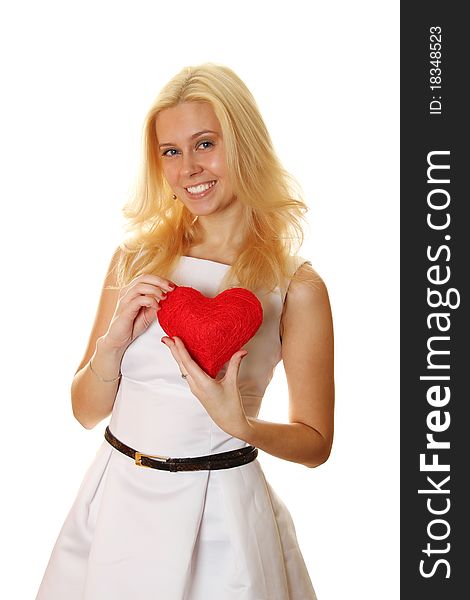 Young attractive elegant woman holding a big red heart. Isolated on a white background. Young attractive elegant woman holding a big red heart. Isolated on a white background