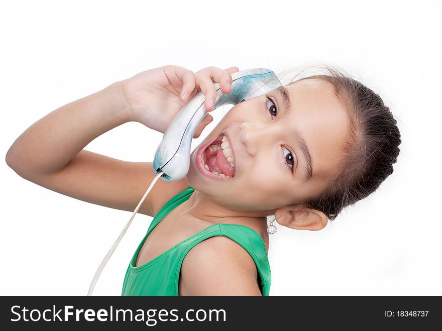 A young girl, isolated on white spoke emotionally on the phone. A young girl, isolated on white spoke emotionally on the phone