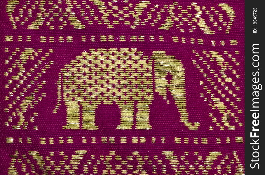 Pink elephant picture made from a knitted fabric