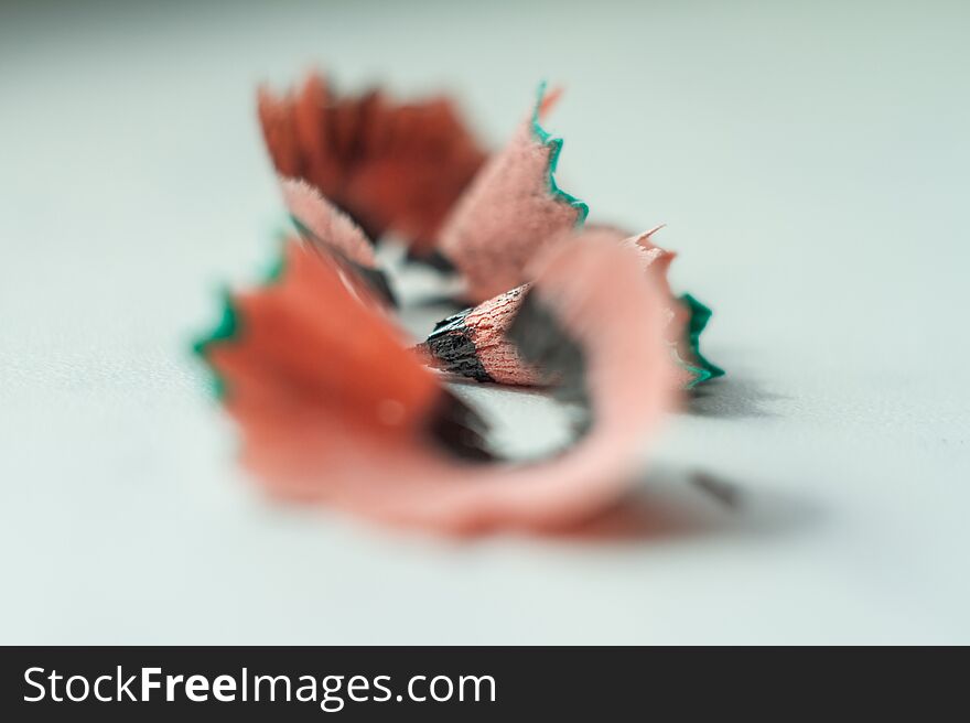 View of pencil shavings through a blurred foreground