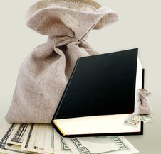 Black Book And Dollars. Stock Images