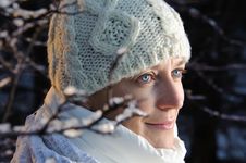 Blue-eyed Woman In White In The Winter Forest. Stock Photography