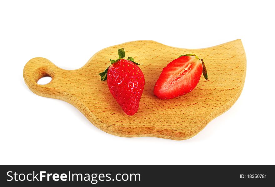 Strawberries on the kitchen board. Strawberries on the kitchen board.