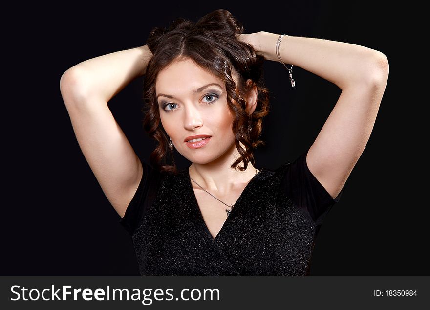 Young brunette woman with long flying hair,