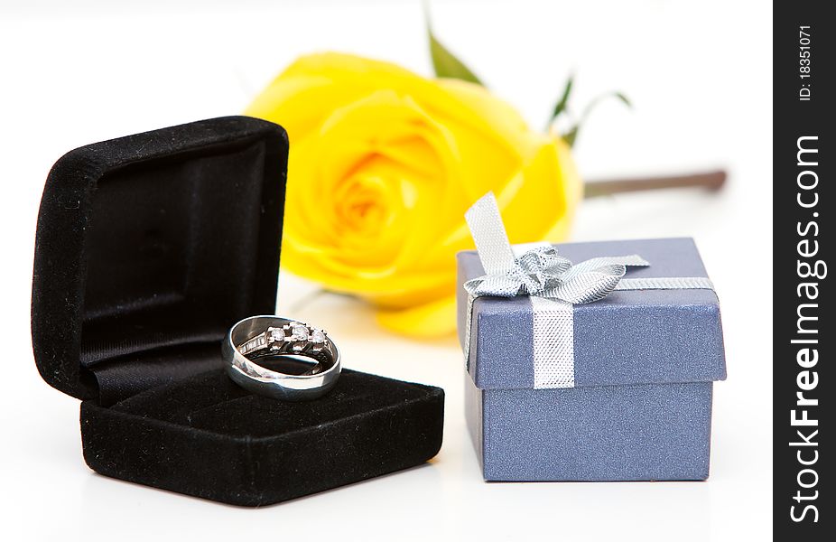 Wedding rings and rose