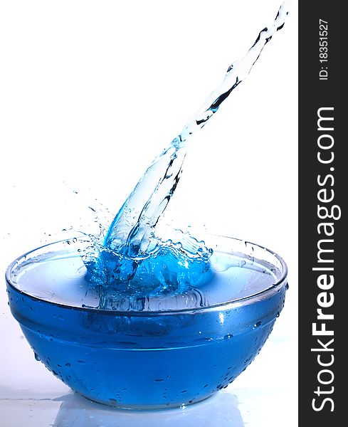 Blue water splash isolated on white background