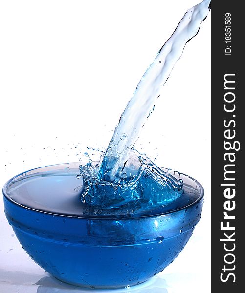 Blue water splash isolated on white background