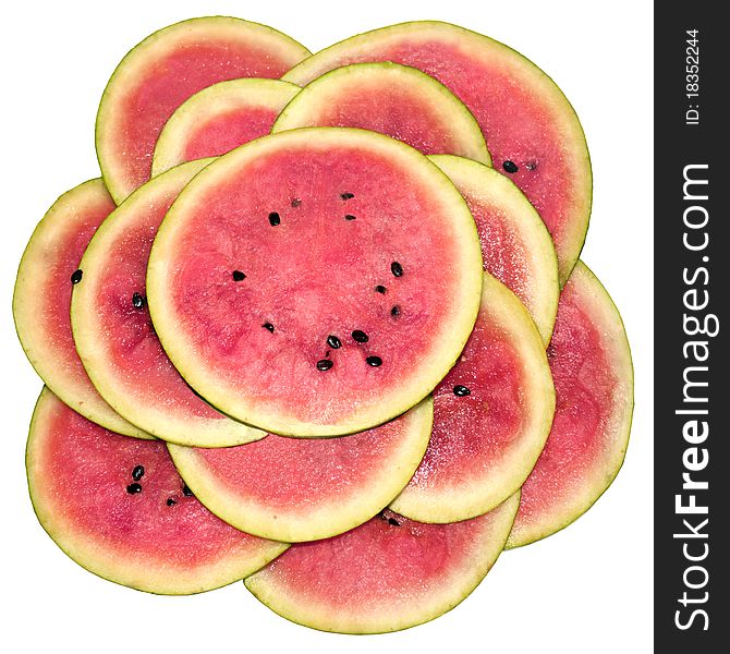 Water-melon fresh, segments cut also is laid out by a flower. Water-melon fresh, segments cut also is laid out by a flower