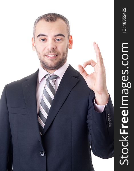 Young handsome businessman doing ok sign. Young handsome businessman doing ok sign