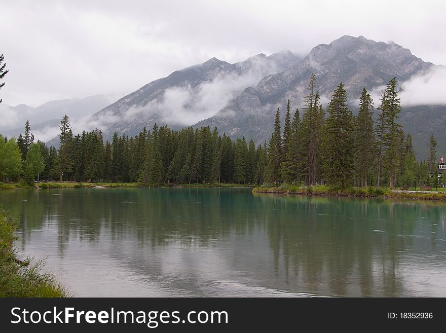 View across bow river in Banff towards rockies