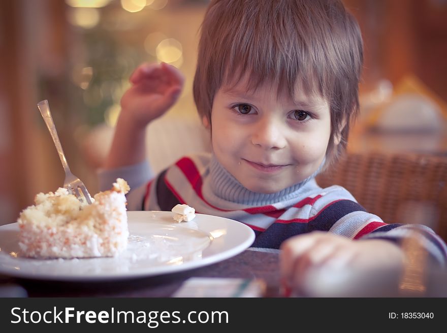 Young boy in cafe