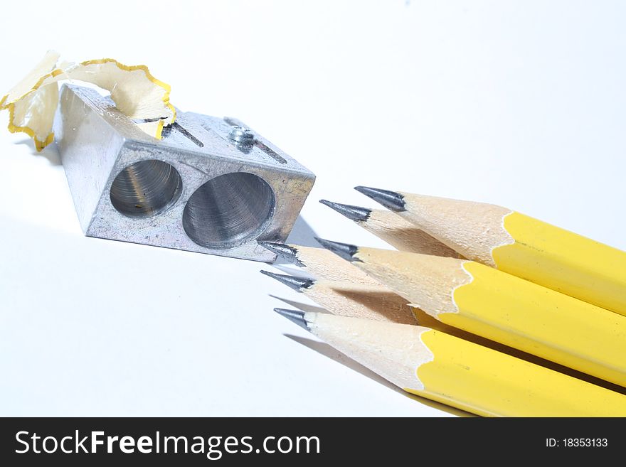 Pen and pencil eat in a white sheet. Pen and pencil eat in a white sheet