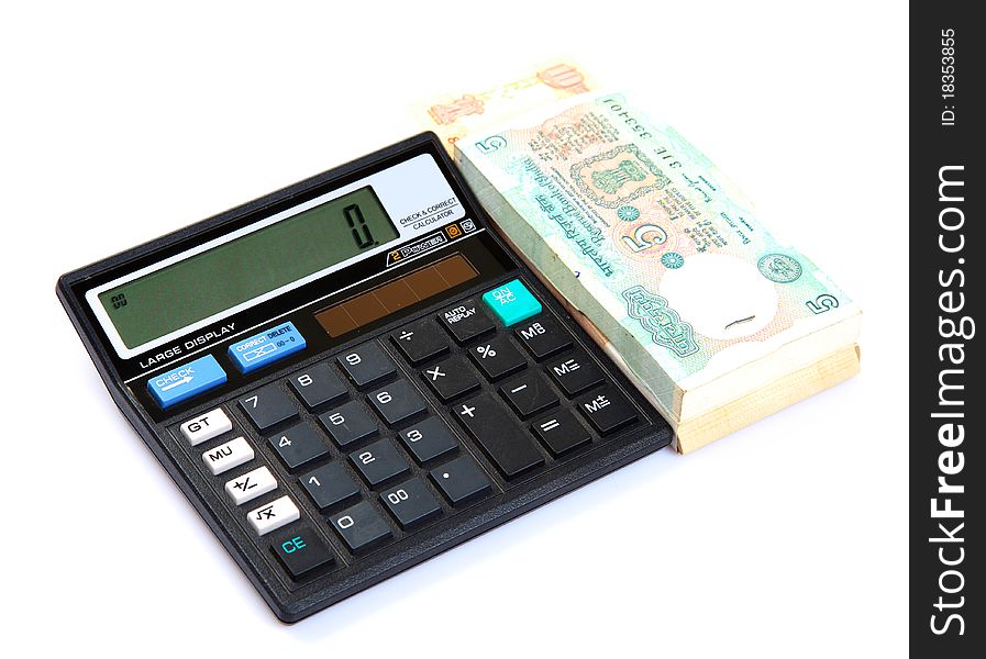 Currency notes with calculator over white isolated background. Currency notes with calculator over white isolated background.