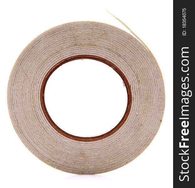 Dual side adhesive tape roll isolated over white background.