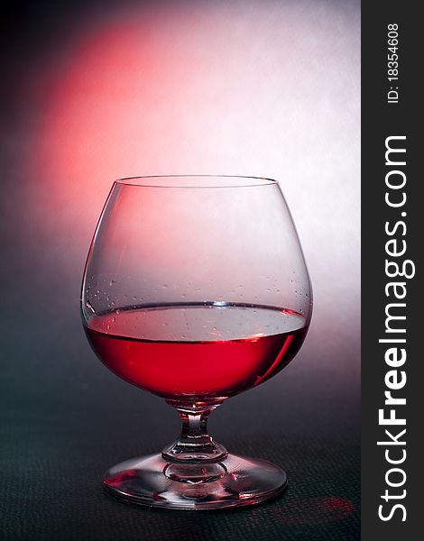 Luxury red liqueur on balloon crysal glass