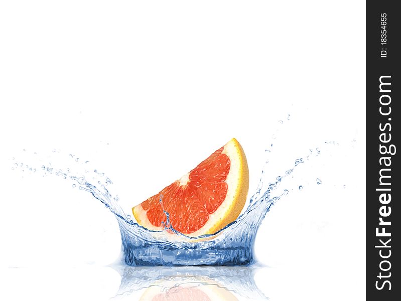 SLice of grapefruit falling into water, isolated on white background. SLice of grapefruit falling into water, isolated on white background