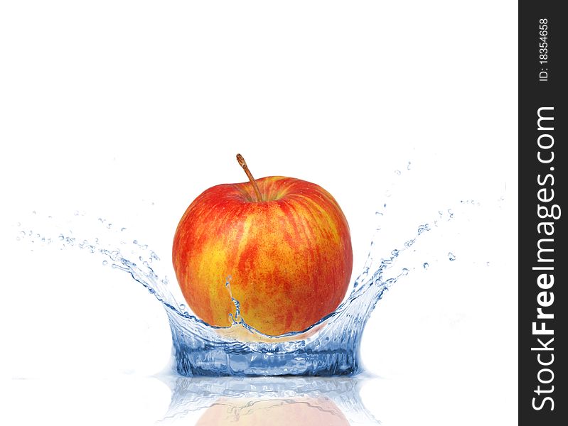 Red apple falling into water, isolated on white background. Red apple falling into water, isolated on white background