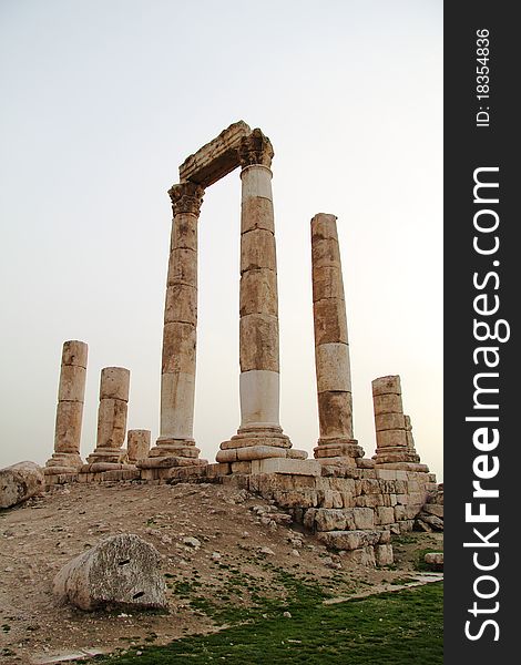 Ruins of the Temple of Hercules present at the Citadel in Amman-Jordan. The photo was taken at sunset. Ruins of the Temple of Hercules present at the Citadel in Amman-Jordan. The photo was taken at sunset.