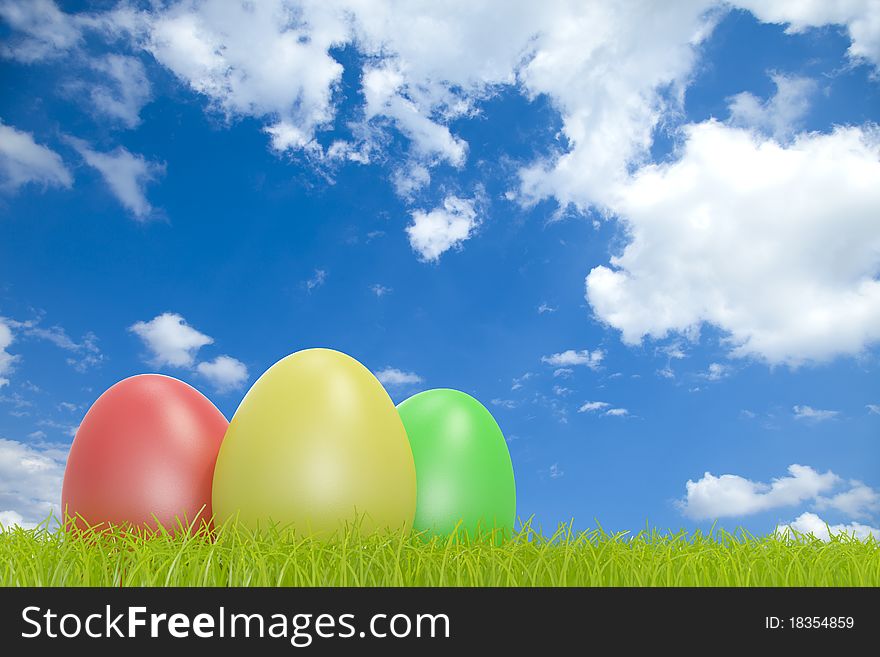 High quality 3d image of colorful easter eggs in front of a cloudy sky with COPYSPACE