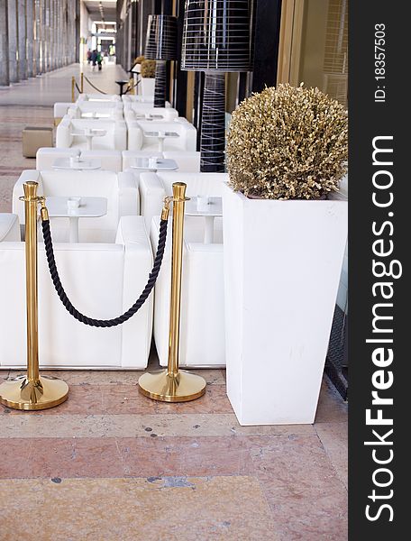 White armchairs in a coffee bar