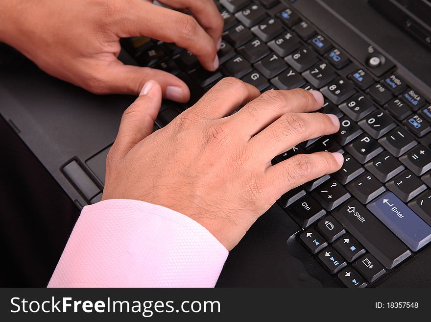Human hands typing on a laptop. Concept Business