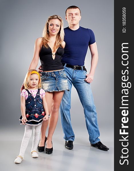Portrait of a young happy family with the kid. Portrait of a young happy family with the kid