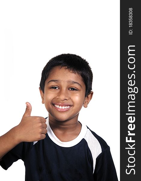 An handsome indian kid looking very excited