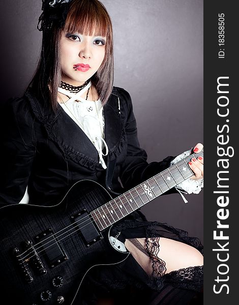 Gothic girl and her guitar. Gothic girl and her guitar