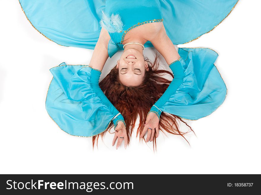 Belly Dancer in a blue stage costume. Belly Dancer in a blue stage costume