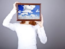 Girl Keep Frame With Clouds Sky Inside. Stock Photography Girl Keep Frame With Clouds Sky Inside. Stock Photography