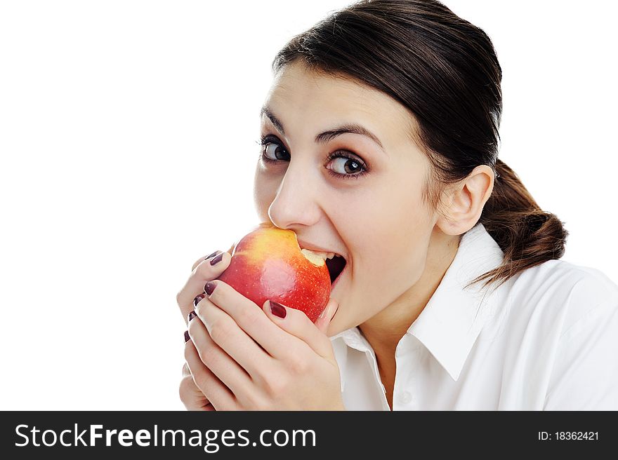 Portrait of a beautiful young woman, holding an apple. Portrait of a beautiful young woman, holding an apple.