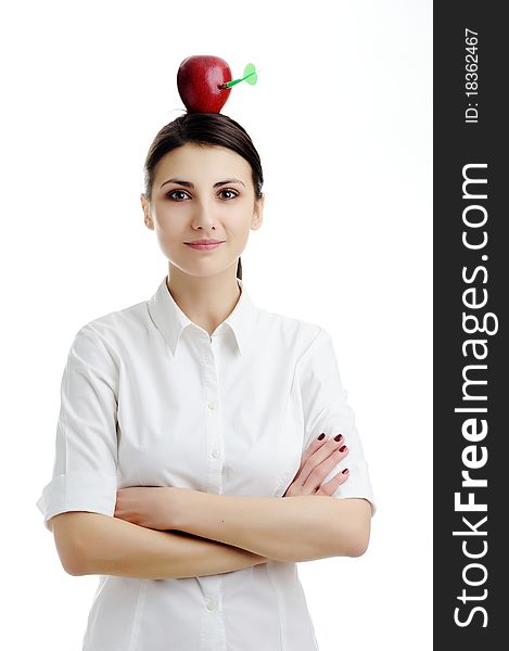 An image of girl with apple on her head. An image of girl with apple on her head.