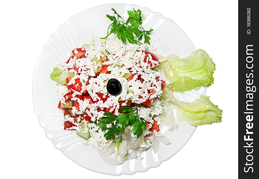 Vegetable salad with feta cheese isolated on white. Vegetable salad with feta cheese isolated on white