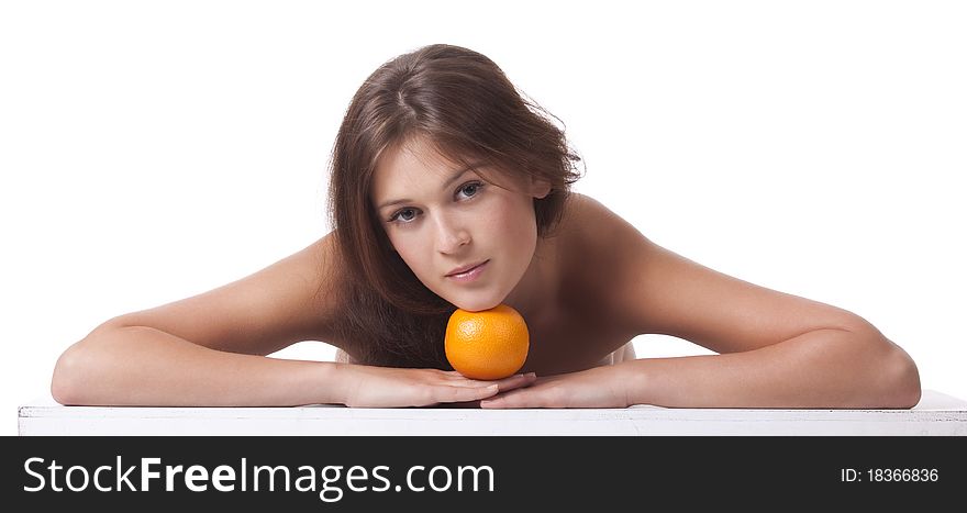 The woman with an orange fruit the isolated image