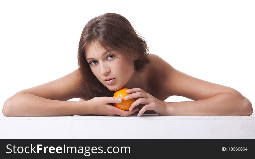 The woman with an orange fruit the isolated image