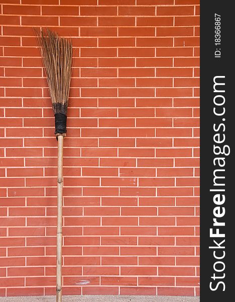 Broom brick on wall