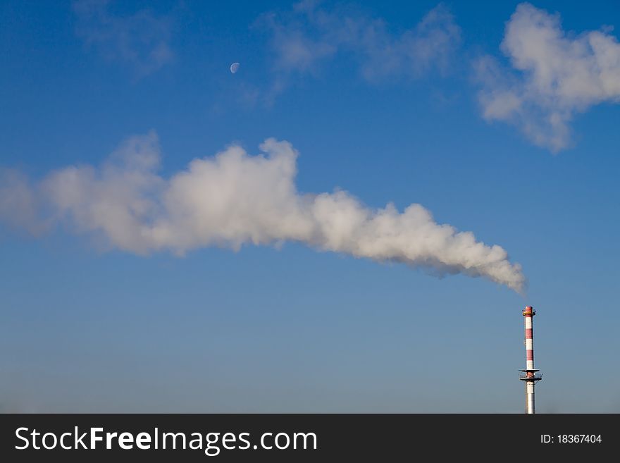 Smoke chimney of incinerator in the blue sky. Smoke chimney of incinerator in the blue sky