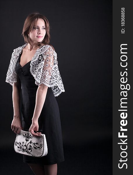 Beauty Young Woman In Lacy Jacket And Handbag