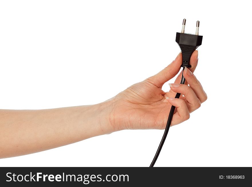 Woman holding black euro plug in the hand